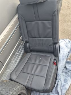 Black Leather Car Seat with Red Stitching