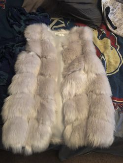 White faux fur vest