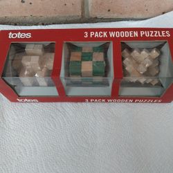 BRAND NEW - WOODEN PUZZLES $15.  FIRM !!