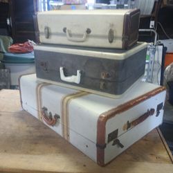 Three Antique Suitcases