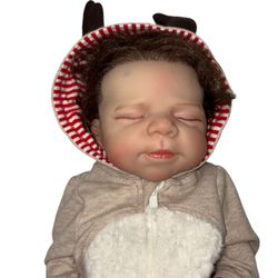 Adorable Baby doll. Looks real. Super cute!