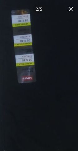 Two brand new black Levi's pants