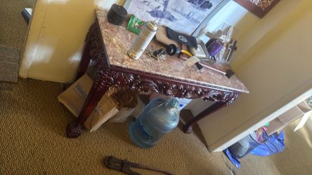 Very nice, solid wood table with marble top would be a great addition to entranceway