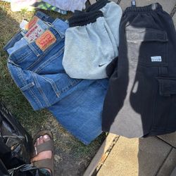 Two Pairs Of Levi’s A Pair Of True Religions, A Large Pair Of Nike Shorts And A Medium Pro Club Sweat Sweats