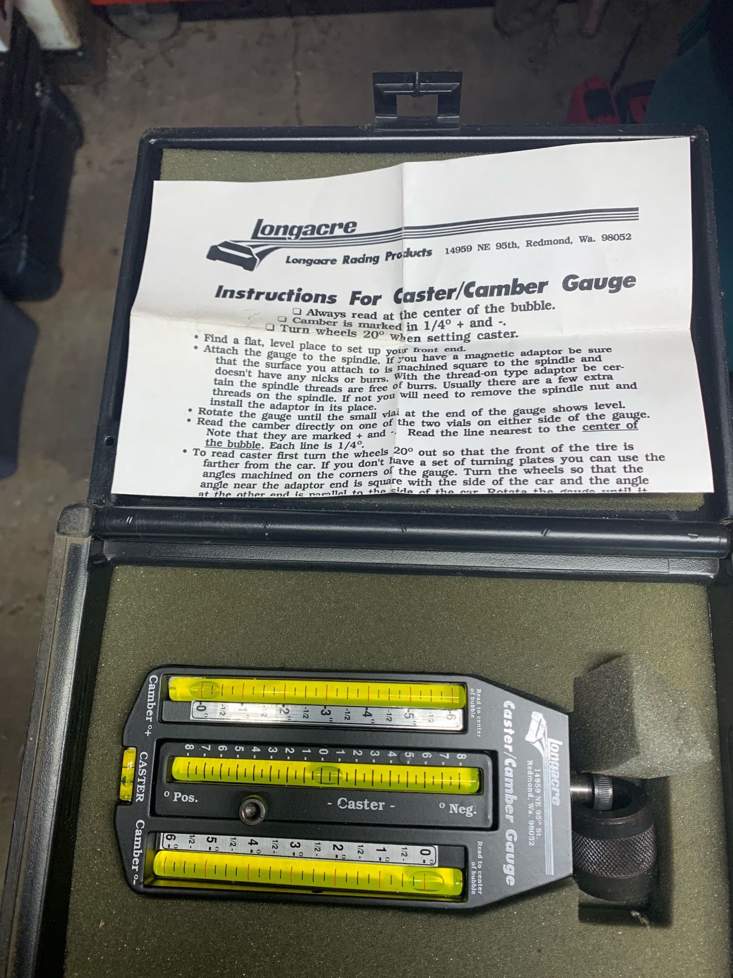 Longacre caster/camber gauge kit used for wheel alignment on race cars and performance cars.