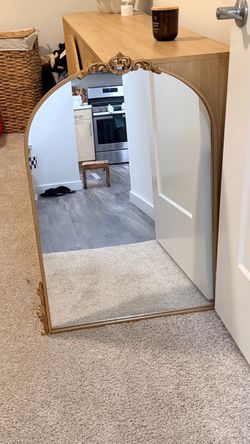 Gold Arch Mirror with Ornate Detail
