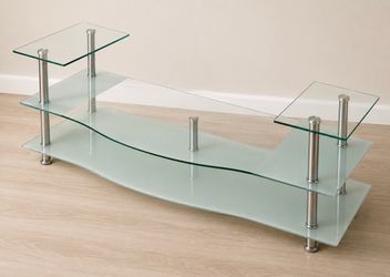 Modern Tempered Glass TV Stand / Contemporary Entertainment Center Console  Modern tempered glass TV stand in excellent condition. Features a stylish 