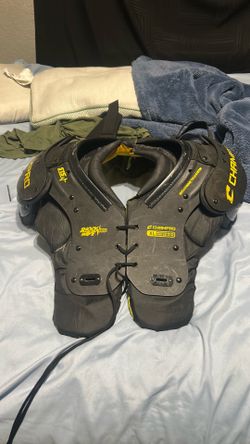 Football shoulder pads shock wave