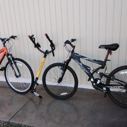 Shimano Aluminum bikes/ Like New/ included bikes holder w/ adapter for 1 or 2 inches Hitch  & chain. Tires still New very little use. 