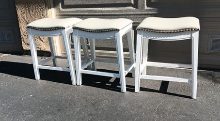 Three White Bar Stools