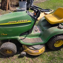 John Deere Riding Lawnmower ($1,000 OBO)