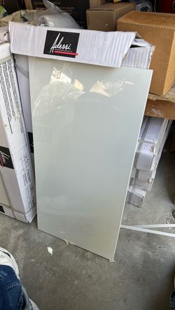 33 boxes of porcelain white tile 12 x 24 528 ft.² for $1000 estimated value about 1700