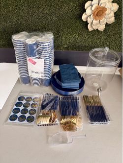 Party Supplies: cups, napkins, plates, silverware, and drink dispenser