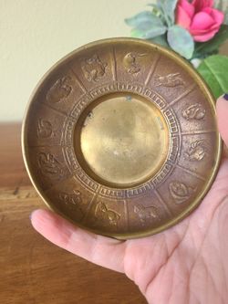 Vintage brass Chinese zodiac trinket tray or candle holder