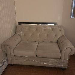 Beige Tufted Loveseat
