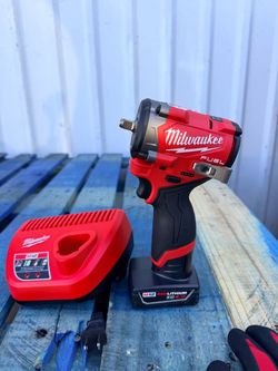 Milwaukee M12 FUEL 12V Li-lon Brushless Cordless Stubby 3/8 in. Impact Wrench with M12 XC Battery 4.0 Ah and Charger Starter Kit NEW $300