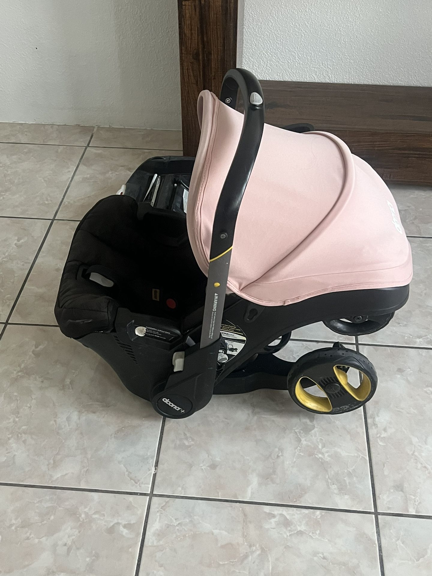 Doona Carseat/ Stroller And Base Included
