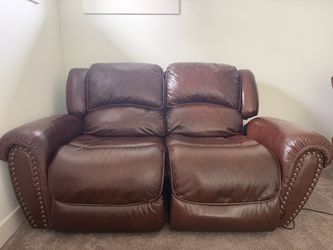Two leather loveseat couches