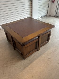 Solid Oak Game Table/Coffee Table With Four Storage Seats With Casters. 
