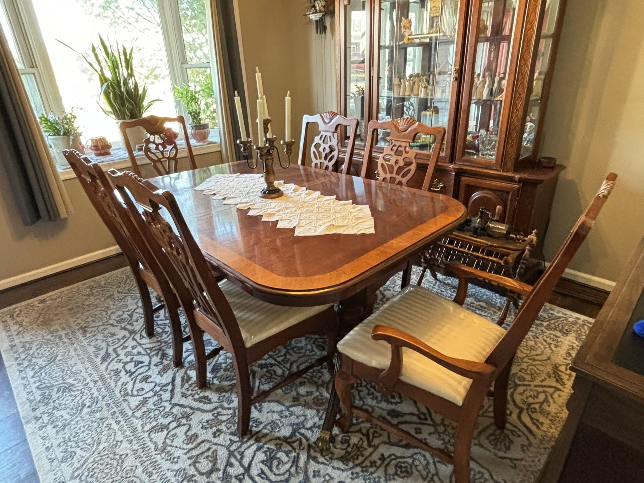 Antique Dining Room Set w/ 6 chairs & extension Leaf and China hutch.