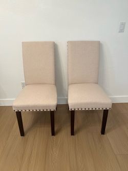 Set of 6 Beige upholstered dining chairs with nailhead trim
