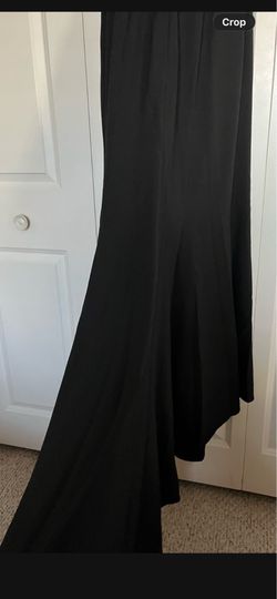 It’s A Beautiful Long Evening Dress The size is Small the color is Black used one time only
