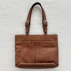 Coach brown leather bag with buckle detail 