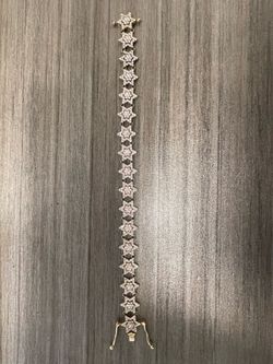 10k - (21 gram) 8 inch Gold Star Diamond Bracelet
