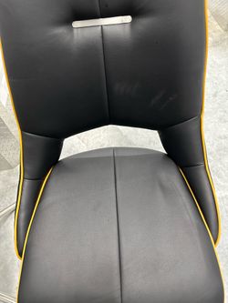 Set of 2 modern dining or accent chairs by Global Furniture USA.