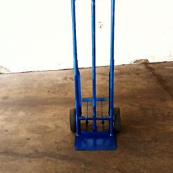 steel hand truck mover with 8" mold on wheels  With kick off lever 800 lbs ln great shape 