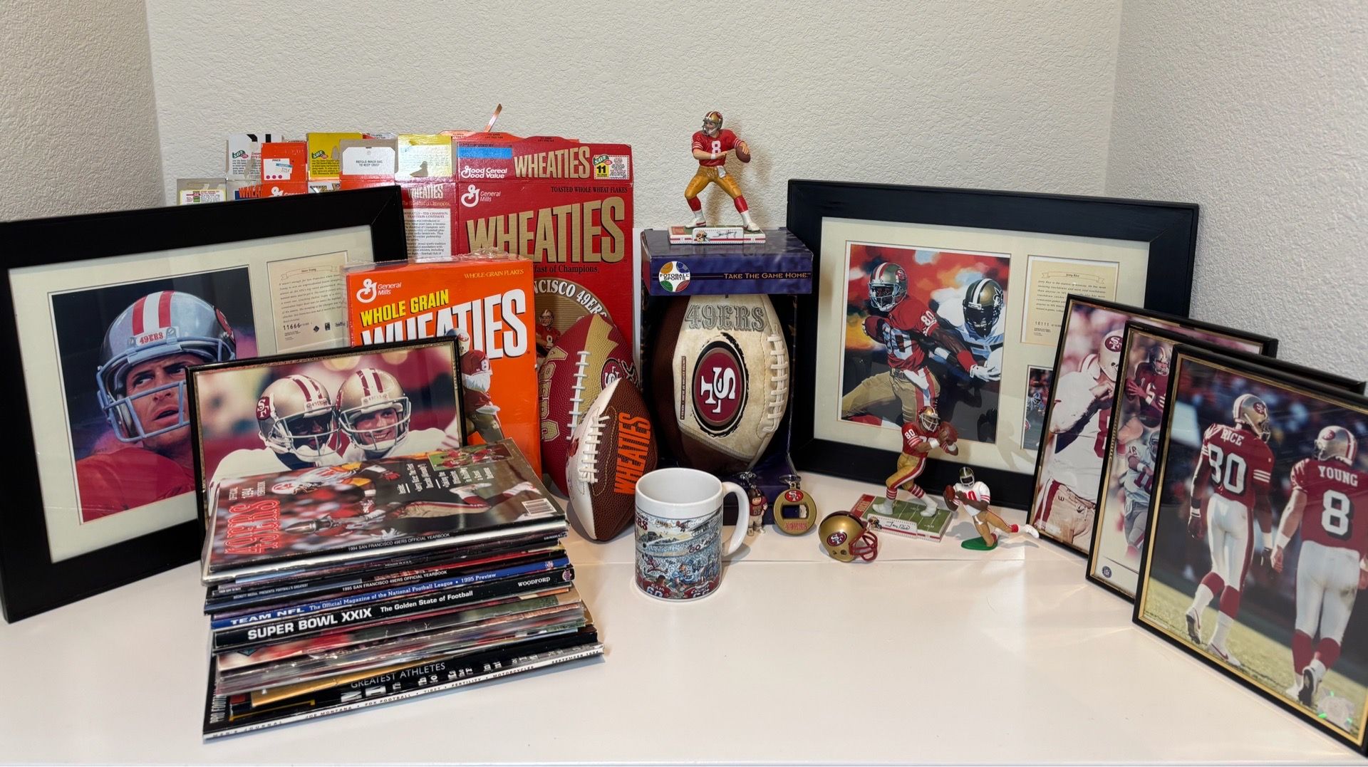 49er lot. Jerry Rice and Steve young. Pictures, figurines, Wheaties box’s, magazines,