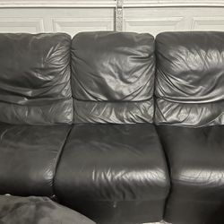 Black leather reclining couch