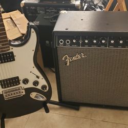 Squier Stratocaster Guitar With Fender 40 Champ Amplifier 
