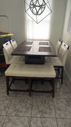 Dining table with chairs and bench