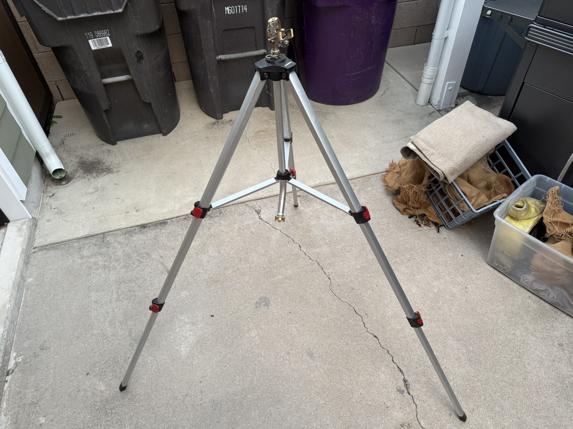 Husky tripod pulsating sprinkler works good adjustable tripod