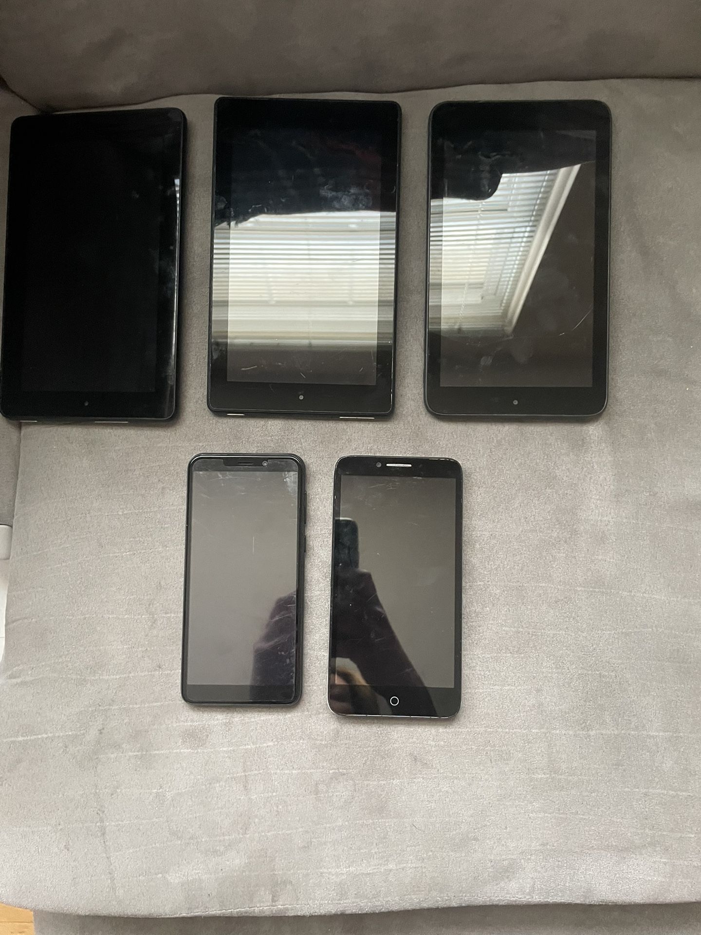 Lot Of Older Model Kindles And Phones