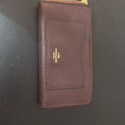 Coach Zipper Wallet.