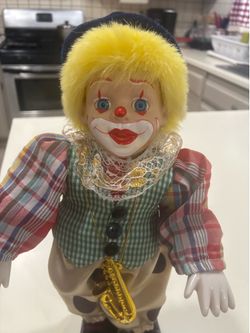 Porcelain clown doll