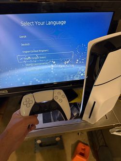PlayStation 5 slim disc edition with 2 controllers