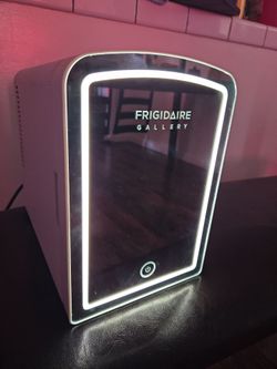 Frigidaire desktop small cooler with light up mirror.