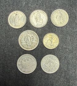 7 foreign silver coins