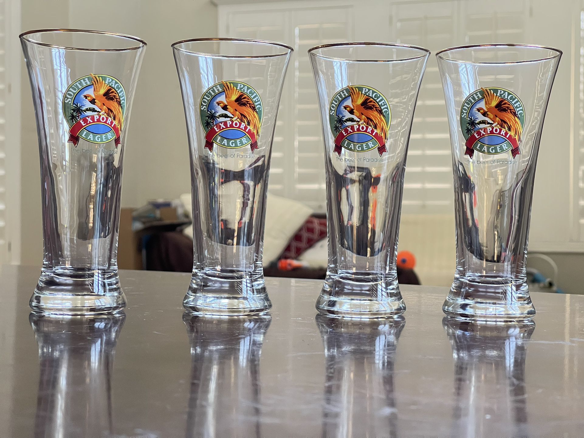 South Pacific Gold Rimmed Pilsner Beer Glasses x4