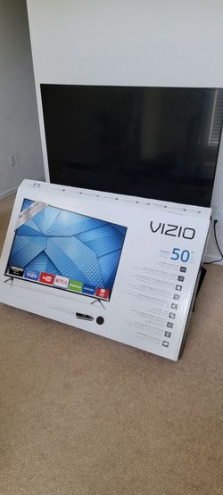 50" 4k Vizio tv with stand and fire tv 4k stick