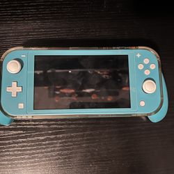 Nintendo Switch Lite | Turquoise | With Grip Cover And Traveling Case 