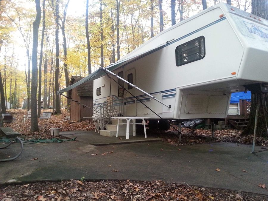 Camper, camp lot, shed located in Treasure Lake
