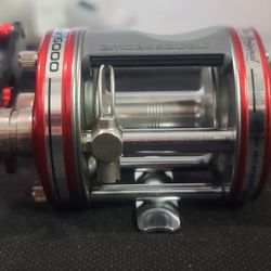 Abu Garcia Ambassaduer 6000 Baitcaster Conventional Reel Fishing - Red FRESHWATER SALTWATER 