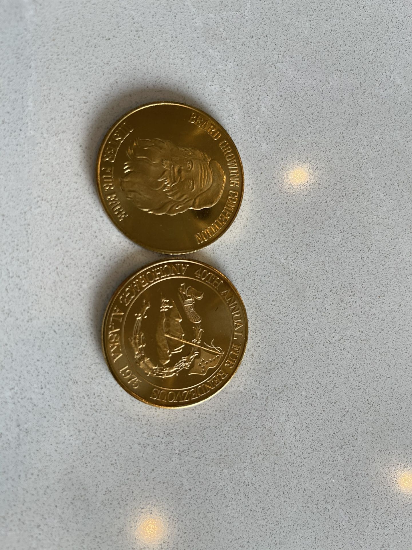 Two 1975 Fur Rendezvous Coins