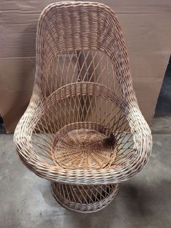 Vintage mid-century pedestal wicker and rattan shell lounge chair