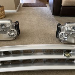 LAND ROVER DISCOVERY GRILL AND HEAD LIGHTS FROM 2005 2006 2007 AND 2008