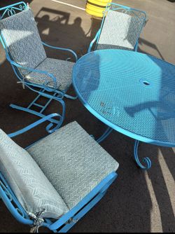 Metal patio table and chairs